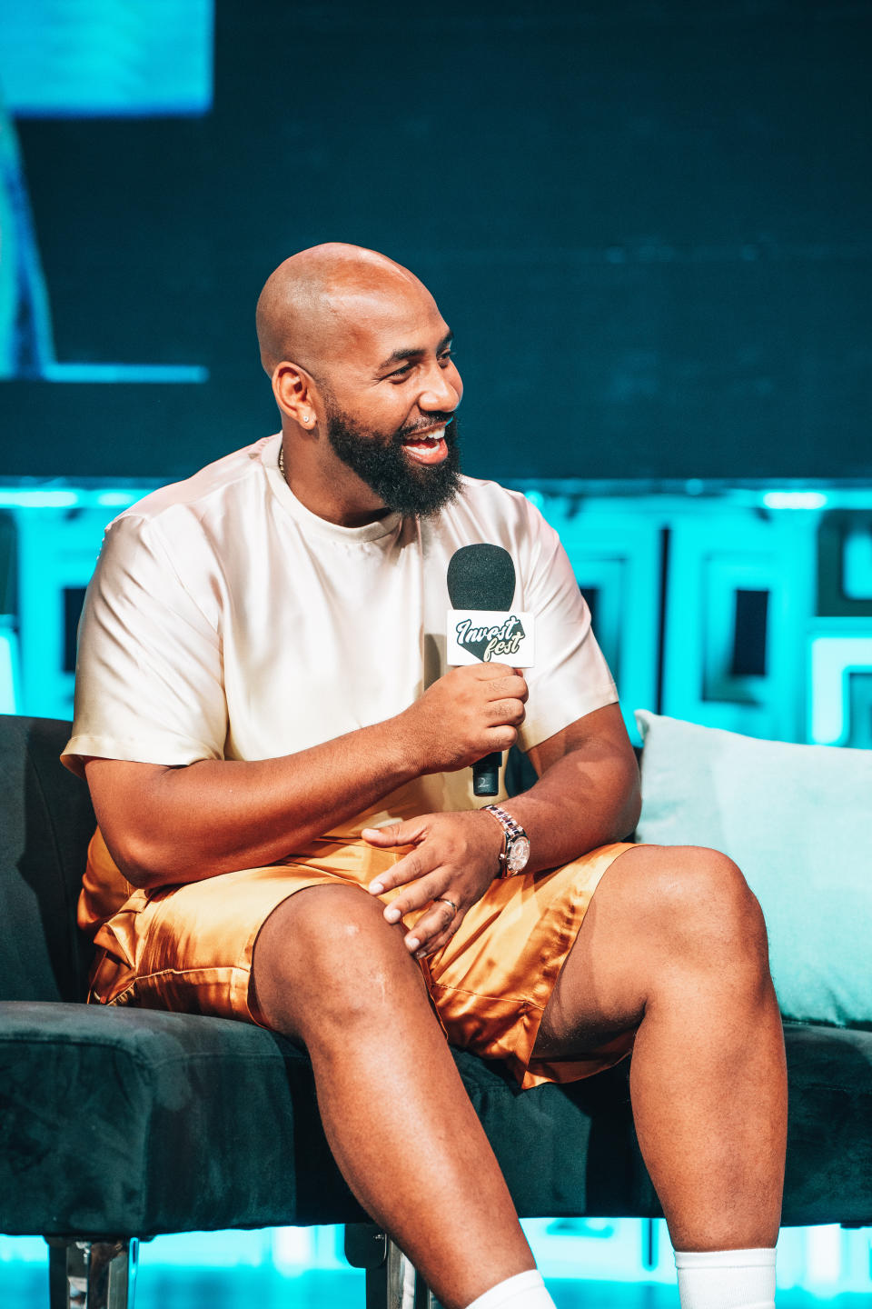 Earn Your Leisure co-founder Troy Millings speaks at InvestFest, which he also co-founded. (Photo Credit: Rashiid Marcel/EYL InvestFest)