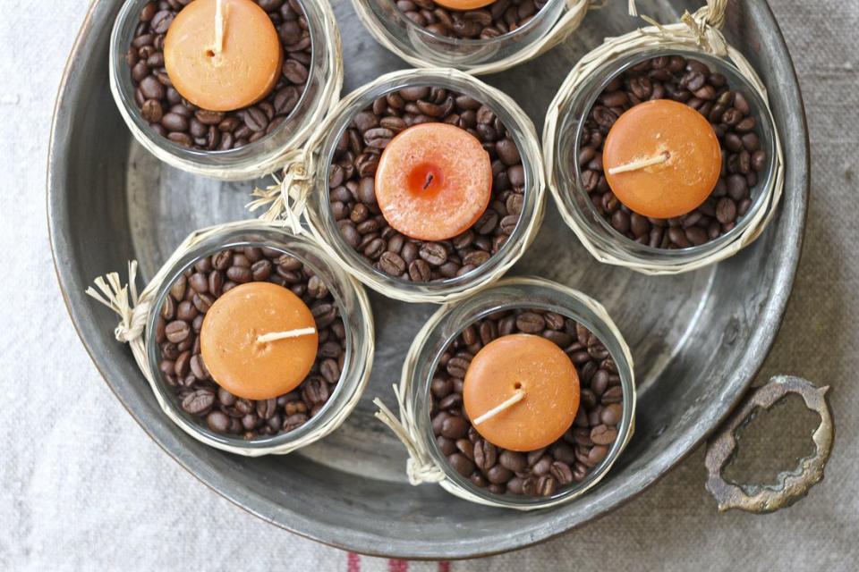 <p>With coffee beans and pumpkin spice candles, this easy centerpiece smells as good as it looks.</p><p><em><a href="http://www.calmcradle.com/blog/fall-diy-simple-candle-and-coffee-bean-centerpiece" rel="nofollow noopener" target="_blank" data-ylk="slk:Get the tutorial at Calm Cradle »;elm:context_link;itc:0;sec:content-canvas" class="link ">Get the tutorial at Calm Cradle »</a></em></p>