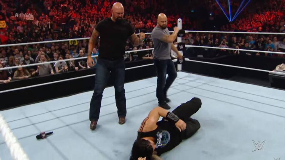 luke gallows and karl anderson floor roman reigns
