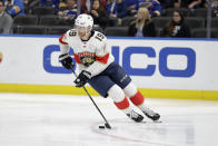 Florida Panthers' Mike Matheson handles the puck during the second period of an NHL hockey game against the St. Louis Blues Monday, March 9, 2020, in St. Louis. (AP Photo/Jeff Roberson)