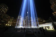 <p>The Tribute in Light beams up into the New York City skyline from the rooftop of a garage in lower Manhattan on Sept. 5, 2018. (Photo: Gordon Donovan/Yahoo News) </p>