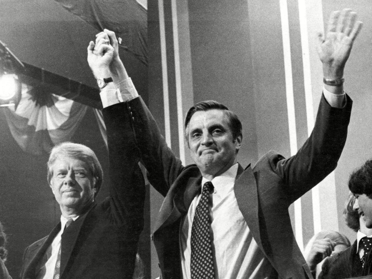 <p>Mondale (right) with Jimmy Carter at the Democratic Convention in 1976</p> (Shutterstock)