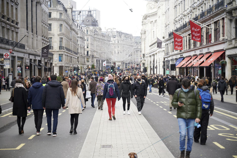 DECEMBER 20th 2020: Emergency lockdown restrictions are imposed in The United Kingdom during the worldwide coronavirus pandemic as health officials take measures to prevent a new variant of the virus from affecting greater Europe. - File Photo by: zz/KGC-247/STAR MAX/IPx 2020 12/5/20 General views of Christmas holiday shoppers on Oxford Street and Regents Street in London on December 5, 2020 - the first Saturday after lockdown restrictions were lifted in The United Kingdom during the worldwide coronavirus pandemic. Many retailers have struggled to stay in business during the financial storm caused by the pandemic - long lines were seen at stores such as Debenhams and Topshop and Topman who recently went into Reorganization Administration and face possible bankruptcy and are offering clearance sale prices on all merchandise just in time for the Christmas holiday shopping season. (London, England, UK)