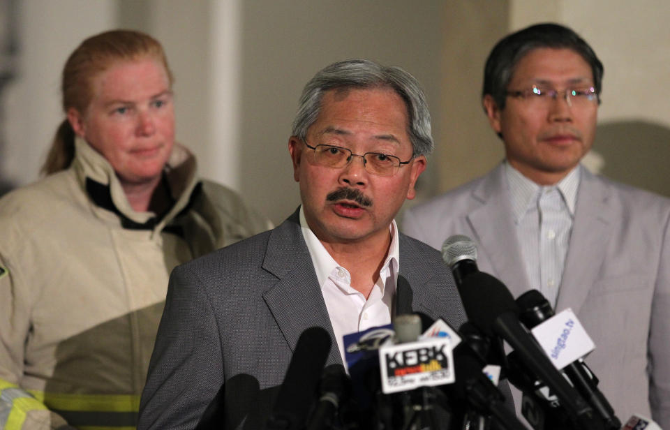 San Francisco Mayor Ed Lee speaks to reporters during a news conference after Asiana Flight 214 crashed at San Francisco International Airport in San Francisco, Saturday, July 6, 2013. (AP Photo/Darryl Bush)