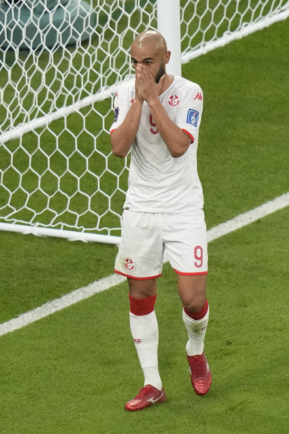 Tunisia's Issam Jebali reacts during the World Cup group D soccer match between Denmark and Tunisia at the Education City Stadium in Al Rayyan, Qatar, Tuesday, Nov. 22, 2022. (AP Photo/Darko Bandic)