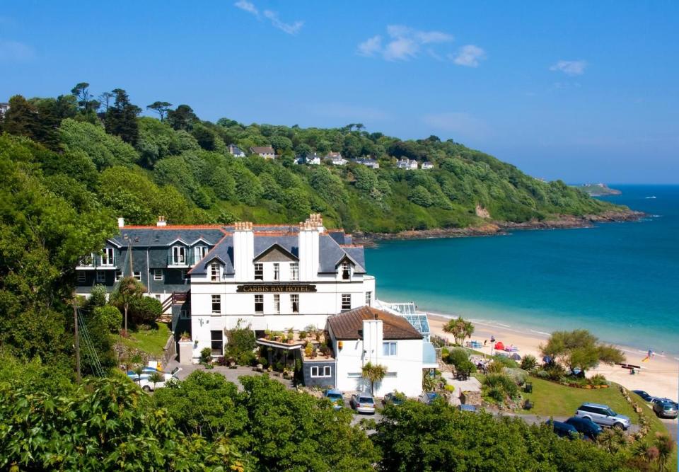 <p>Sitting on its own Blue Flag beach and set within 125 acres, the Carbis Bay Estate comprises the luxury <a href="https://www.booking.com/hotel/gb/carbis-bay-hotel.en-gb.html?aid=2070936&label=family-holidays-cornwall" rel="nofollow noopener" target="_blank" data-ylk="slk:Carbis Bay Hotel;elm:context_link;itc:0;sec:content-canvas" class="link ">Carbis Bay Hotel</a> as well as a range of self-catering accommodation and serviced apartments, lodges and suites perfect for a Cornwall family holiday.</p><p> With picturesque St Ives, just a 25-minute walk along the coastal path, the hotel is perfect for exploring the seaside haven. The Beach Club has family-friendly all-day dining with a terrace overlooking the sea, ideal for watching out for seals bobbing in the surf. There's an amazing spa with a heated pool and hot tubs, plus a 2 AA rosetted restaurant ‘Sands’ for more formal dining parents will love. </p><p>Children of all ages are catered for, with kids' clubs running in the school holidays, crafts at the main hotel and excursions on the beach, as well as babysitters for younger children when parents need a break. </p><p><a class="link " href="https://www.booking.com/hotel/gb/carbis-bay-hotel.en-gb.html?aid=2070936&label=family-holidays-cornwall" rel="nofollow noopener" target="_blank" data-ylk="slk:CHECK AVAILABILITY;elm:context_link;itc:0;sec:content-canvas">CHECK AVAILABILITY</a></p>