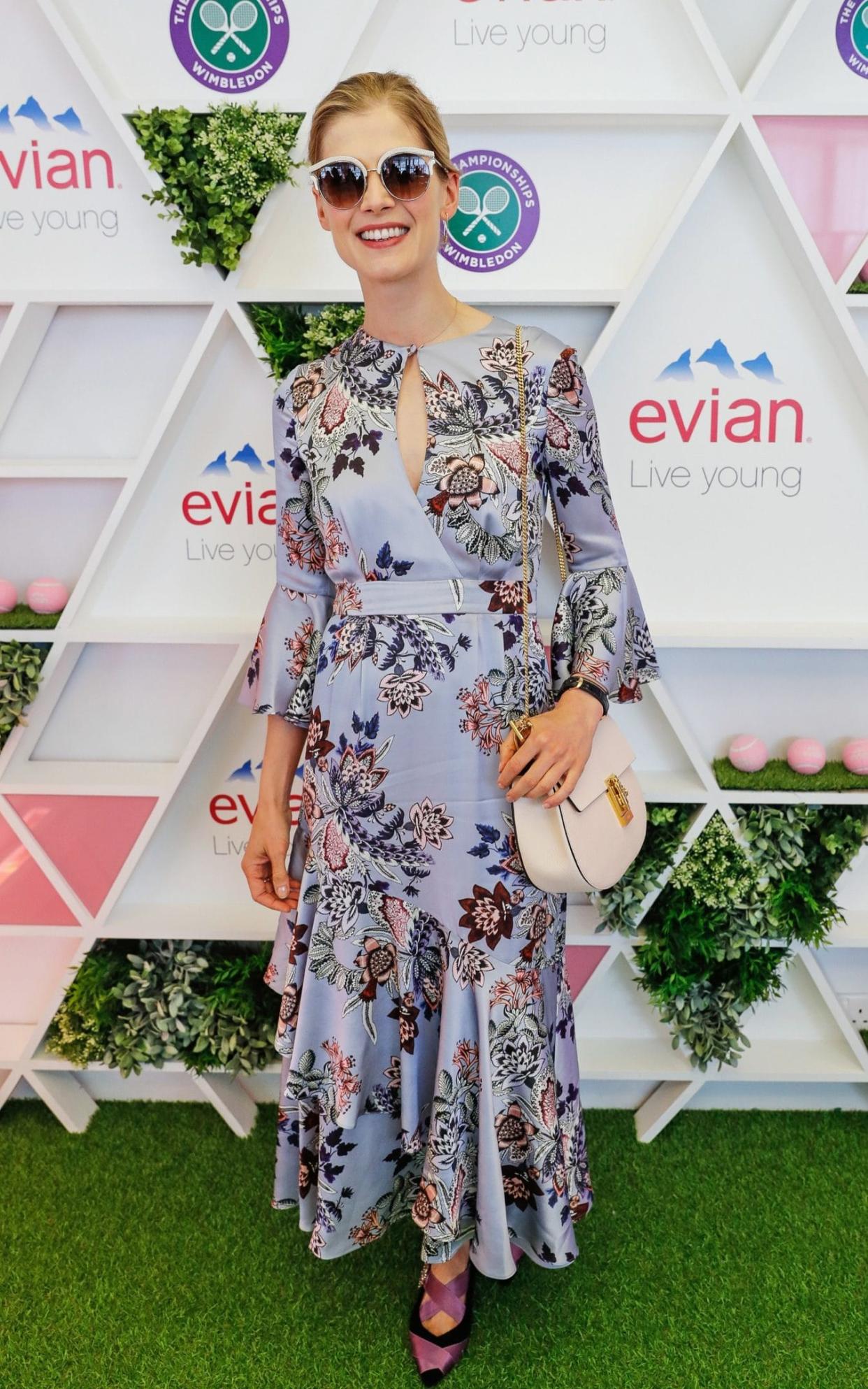 Rosamund Pike nailed dressing for Wimbledon last year with a printed dress and polished accessories  - Getty Images Europe