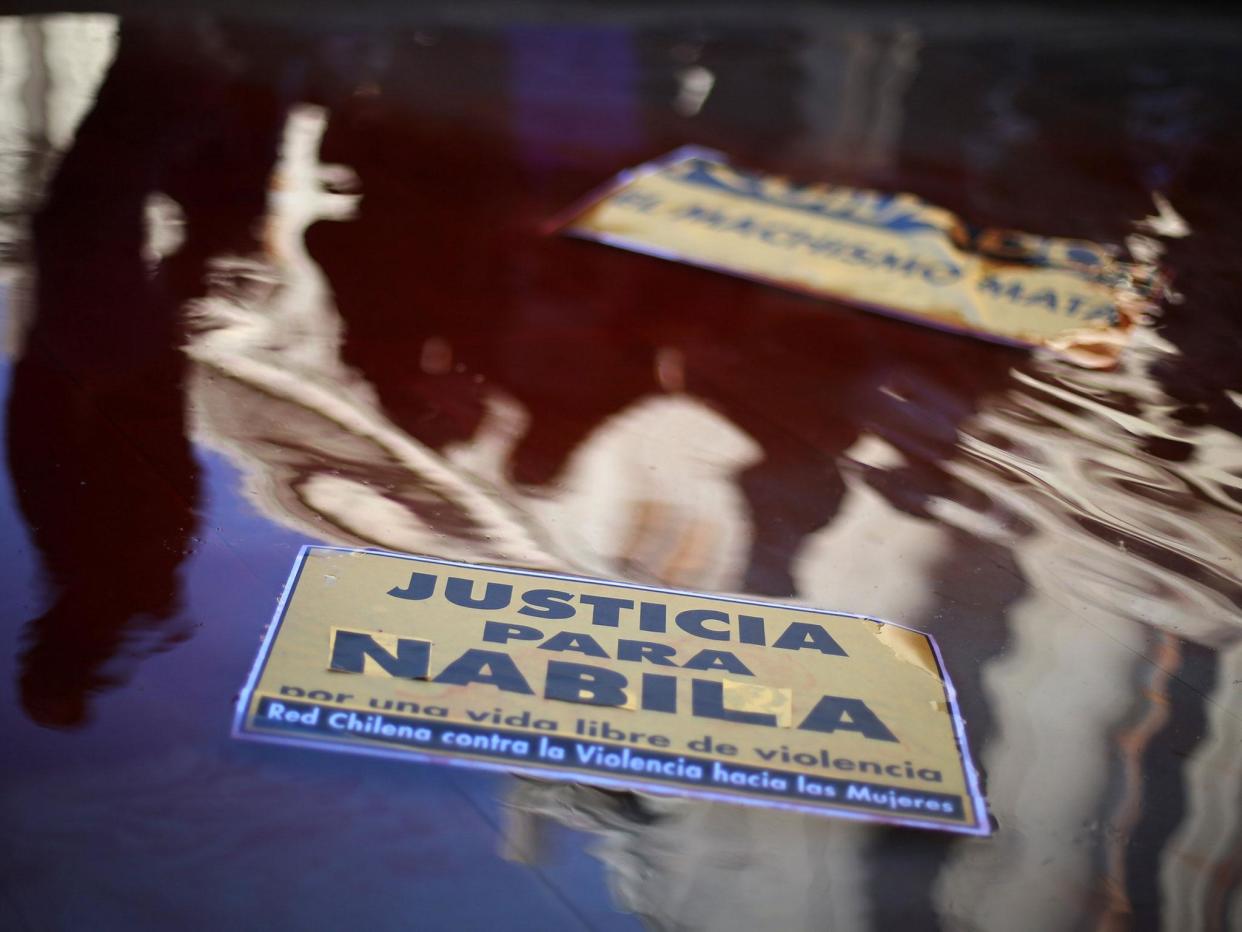 Signs reading 'Justice for Nabila, for a life free from violence' were brandished as women protested the reduction of Mauricio Ortega's sentence: EPA/MARIO RUIZ