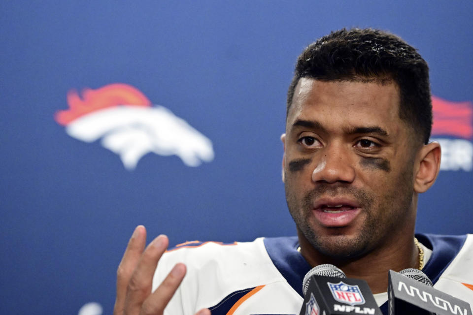 Denver Broncos quarterback Russell Wilson addresses the media after an NFL football game against the Detroit Lions, Saturday, Dec. 16, 2023, in Detroit. (AP Photo/David Dermer)