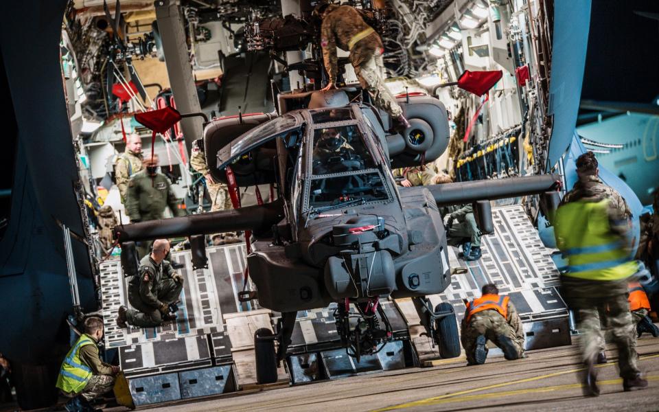 The new Apache AH-64E helicopters being off-loaded - Cpl Lee Matthews