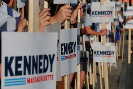 Supporters wait for U.S. Rep. Kennedy III to arrive to announce his candidacy for the U.S. Senate in Boston