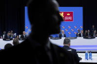 From left, Spanish Prime Minister Pedro Sanchez, Turkish Foreign Minister Mevlut Cavusoglu, U.S. President Joe Biden, and NATO Secretary General Jens Stoltenberg are seated before attending a round table meeting at a NATO summit in Madrid, Spain on Wednesday, June 29, 2022. North Atlantic Treaty Organization heads of state will meet for a NATO summit in Madrid from Tuesday through Thursday. (Brendan Smialowski/Pool Photo via AP)