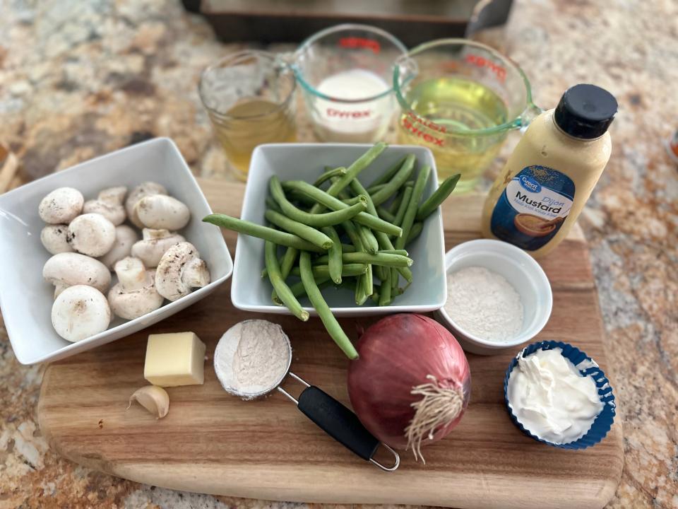 ingredients for  alex guarnaschelli's green bean casserole on a kitchen counter