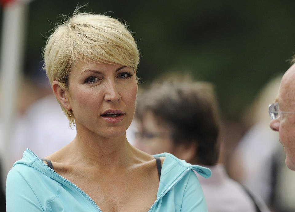 FILE- In this Sunday, June 27, 2010 file photo Heather Mills attends the Achilles Hope and Possibility Race in New York's Central Park. On Tuesday, July 24, 2012, British prosecutors announced charges against eight people alleged to have been involved in a phone hacking scheme with more than 600 targets. Some of the prominent alleged victims of the phone hacking are thought to have included, Paul McCartney, Heather Mills, Angelina Jolie, Brad Pitt, Jude Law, Sadie Frost, Sienna Miller, Wayne Rooney, Sven-Goran Eriksson, Lord Frederick Windsor, John Prescott, as well as murdered 13-year old school girl who was abducted in 2002 Amanda "Milly" Dowler. (AP Photo/Stephen Chernin, File)
