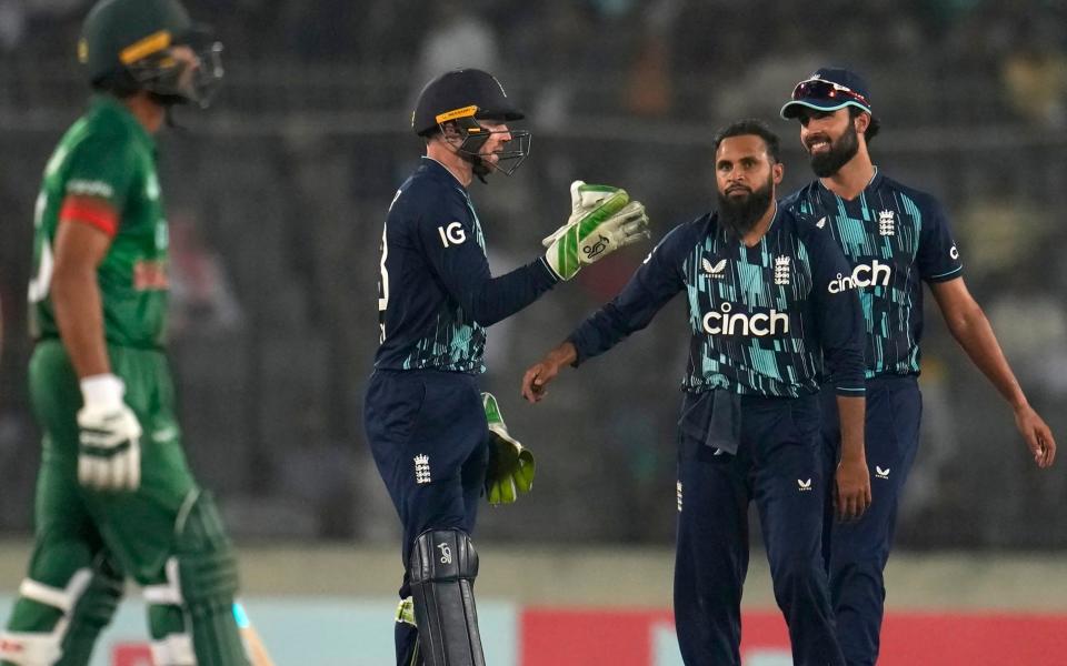 Adil Rashid celebrates the wicket of Afif Hossain - Aijaz Rahi/AP