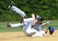 CHICAGO, IL - MAY 18: Gordon Beckham #15 of the Chicago White Sox tags out David DeJesus #9 of the Chicago Cubs in the fifth inning on May 18 2012 at Wrigley Field in Chicago, Illinois. (Photo by David Banks/Getty Images)