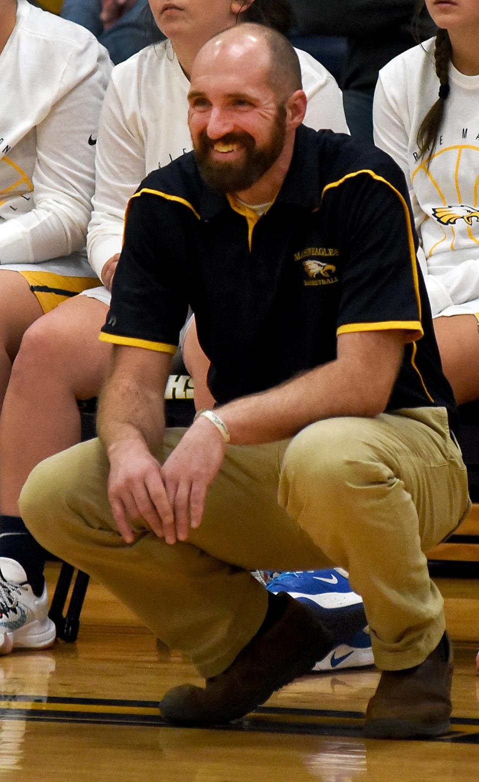 Erie Mason girls basketball coach Josh Sweigert was smiling as his team was leading at halftime over Airport Tuesday night. The Eagles won 53-35.