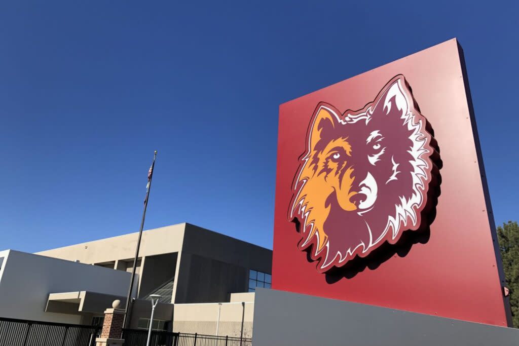 Photo of the Northern State University wolf mascot outside the university's football complex.