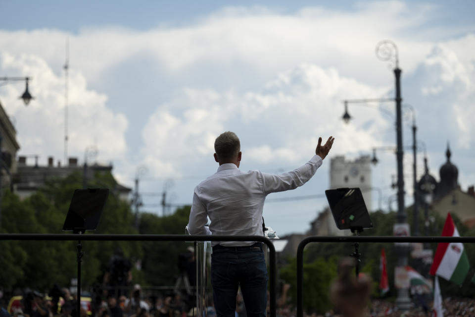 Péter Magyar, a rising challenger to Hungarian Prime Minister Viktor Orbán, addresses people at a campaign rally in the rural city of Debrecen, Hungary, on Sunday, May 5, 2024. Magyar, whose TISZA party is running in European Union elections, has managed to mobilize large crowds of supporters on a campaign tour of Hungary's heartland, a rarity for an Orbán opponent. (AP Photo/Denes Erdos)