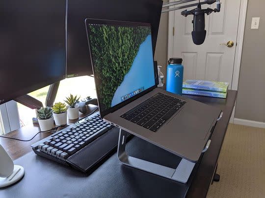 A simple ergonomically-designed laptop stand