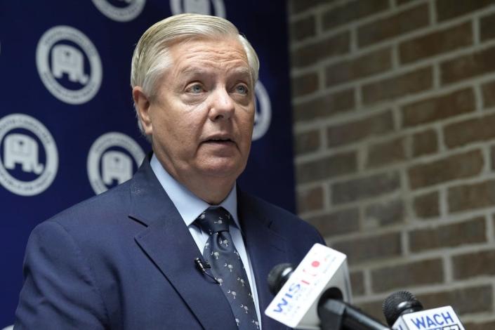 Sen. Lindsey Graham, R-S.C., speaks to reporters about the indictment of former President Donald Trump during a media availability on Wednesday, April 5, 2023, in Columbia, S.C.