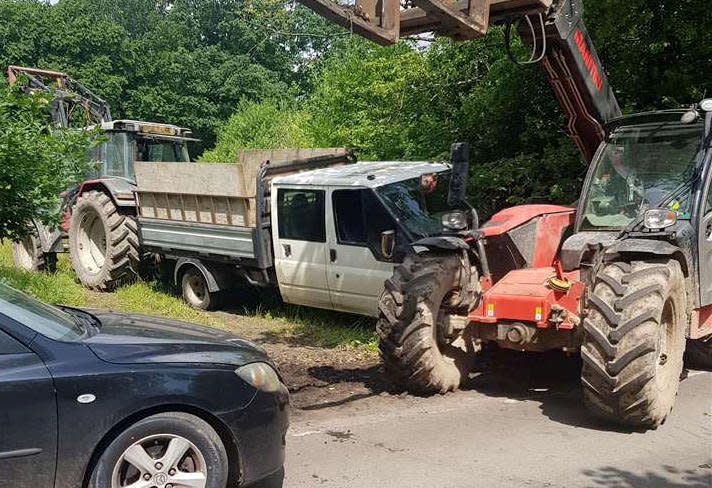 Fly-tippers have been caught in the act after farmers and a motorist took matters into their own hands to catch the louts by chasing after them blocking in their vehicles.  See SWNS story SWNNflytip.  Farmer Steve Jones trapped the perpetrators with a car and was joined by his sons Trevor and Josiah in their tractor and rough-terrain forklift after getting fed up with repeated incidents of rubbish being dumped on his land.  The suspects were snared in woods at Blue Bell Hill near Chatham in Kent and on farmland around 30 miles away at Harvel House Farm near Meopham and are now being investigated by authorities.  Mr Jones said rubbish being dumped on his land was becoming a daily occurrence so his family decided to take action. Along with his two sons, they used walkie talkies to co-ordinate their operation last Friday (July 2) at around 9.45am.  After blocking the fly-tippers' van, one man fled the scene while another remonstrated with the farmers and threatened to smash through the barricade, Mr Jones said.  He tried to escape by mounting the verge but was unable to get through so he also left before police arrived to seize the vehicle, Mr Jones said. 