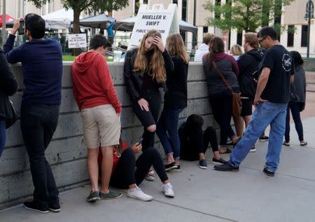 Taylor Swift fans wait outside Denver Federal Court to be let into the Swift groping trial in Denver U.S. August 9, 2017. REUTERS/Rick Wilking