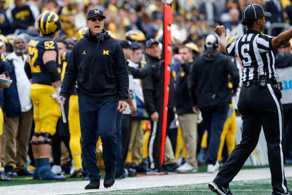 Michigan head coach Jim Harbaugh reacts to a play against Maryland during the first half at the Michigan Stadium in Ann Arbor on Saturday, Sept. 24, 2022.