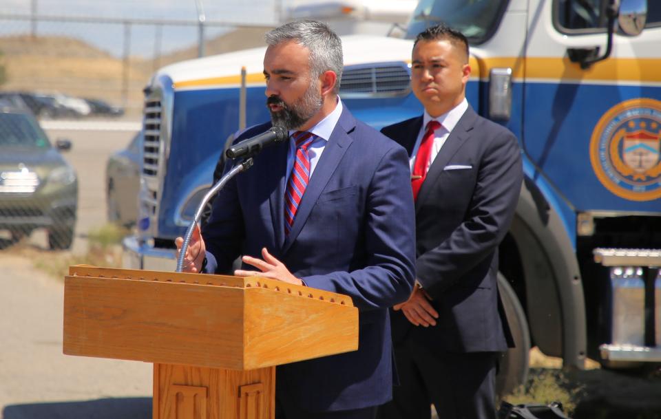 New Mexico Attorney General Raul Torrez addresses the media during a press conference Monday, May 13, 2024 outside the San Juan County Sheriff's Office Lee Acres station as U.S. Attorney Alexander Uballez listens.