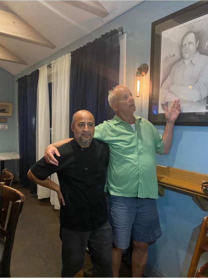 Jaime, left, one of our head sushi chefs at Turk's Seafood, poses with Bill Murray, left. The man in the drawing is Richard Pasquill Sr. who went by “Turk” who is the original owner of the restaurant. His son Richard Pasquill Jr now runs the restaurant.