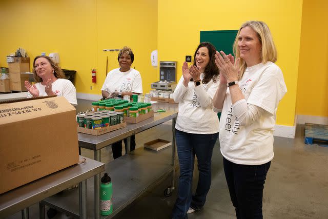 Bank of America staffers volunteer at the Food Bank of Delaware.