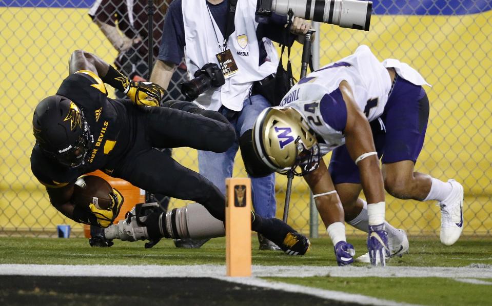 Arizona State wide receiver N’Keal Harry (1) gets stopped just short of the end zone by Washington defensive back Ezekiel Turner (24) during the first half of an NCAA college football game, Saturday, Oct. 14, 2017, in Tempe, Ariz. (AP Photo/Ross D. Franklin)