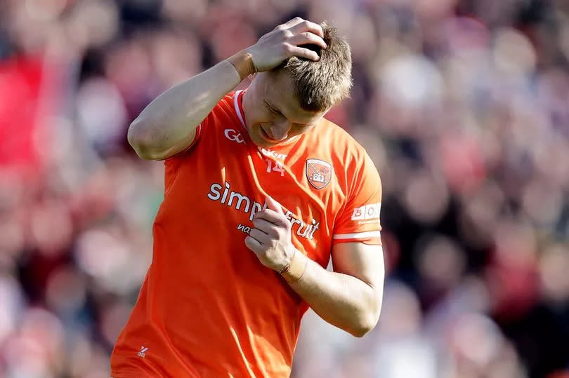 Armagh's Rian O'Neill show his frustration after missing a penalty during the shootout against Derry in last year's Ulster SFC Final 
dejected after missing a penalty