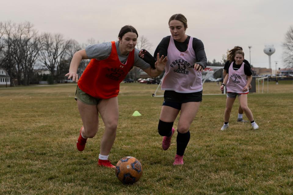 Senior Autumn Diduch (right) chases after the ball during practice on Wednesday, March 13, 2024 at Freeport High School.