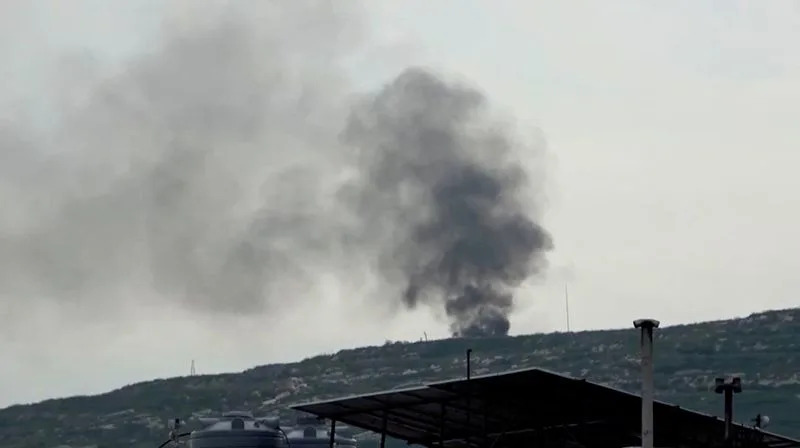 FILE PHOTO: Smoke rises from a site believed to have been hit by an Israeli strike, in southern Lebanon