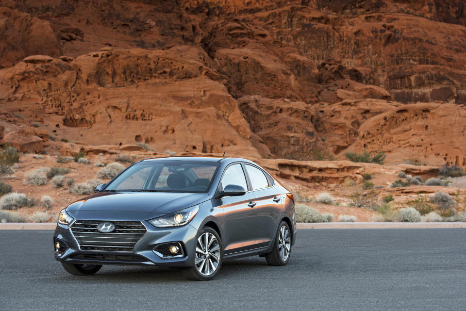 This photo provided by Hyundai shows the 2020 Hyundai Accent, a small hatchback that offers great fuel economy and a comfortable ride but can be spartan in the lower trim levels. With the rampant popularity of SUVs, small, cheap cars are riding off into the sunset. If you need an efficient and low-priced vehicle, we suggest getting one of these sub-$25,000 models now before they’re gone for good. (Hyundai Motor America via AP)