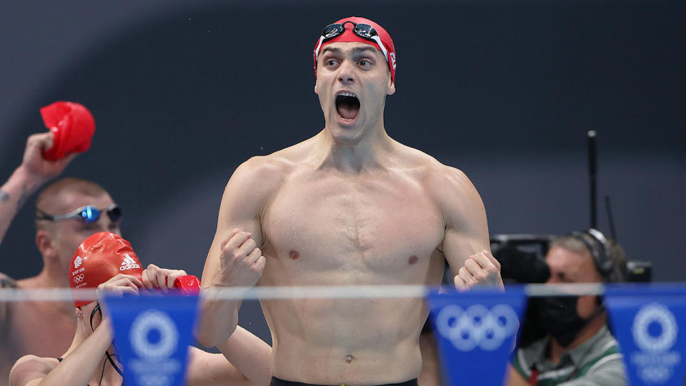 Seen here, Britain's James Guy celebrates a gold in the mixed medley relay. 