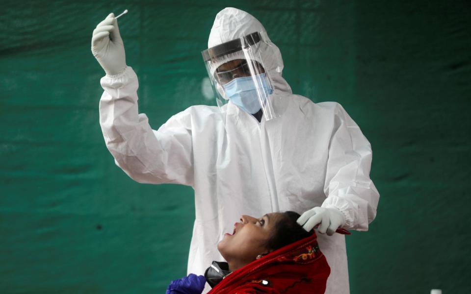 India's beleaguered public health system has struggled to slow the spread of the virus - Francis Mascarenhas/Reuters