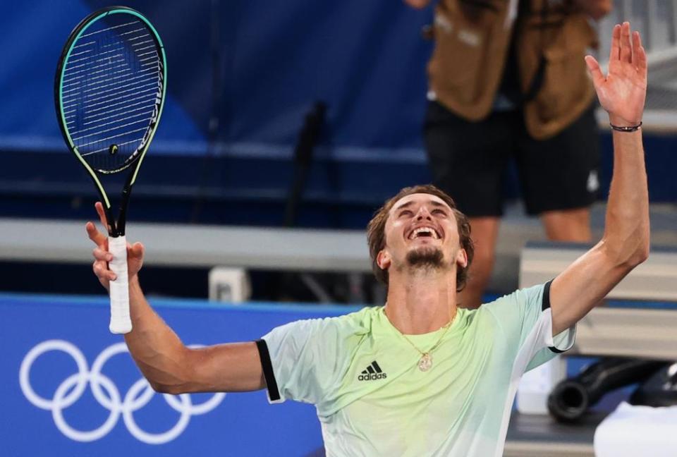 Alexander Zverev of Germany celebrates after winning his gold medal match.