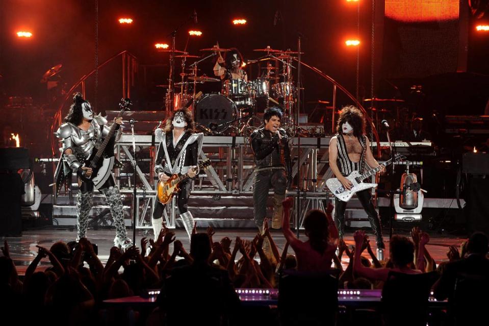 Adam Lambert and KISS perform a medley onstage during the Season 8 finale of "American Idol."