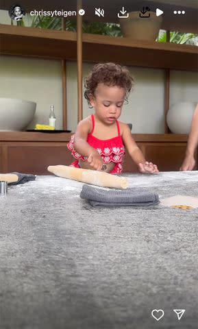 <p>Chrissy Teigen /Instagram</p> Esti Maxine making cookies