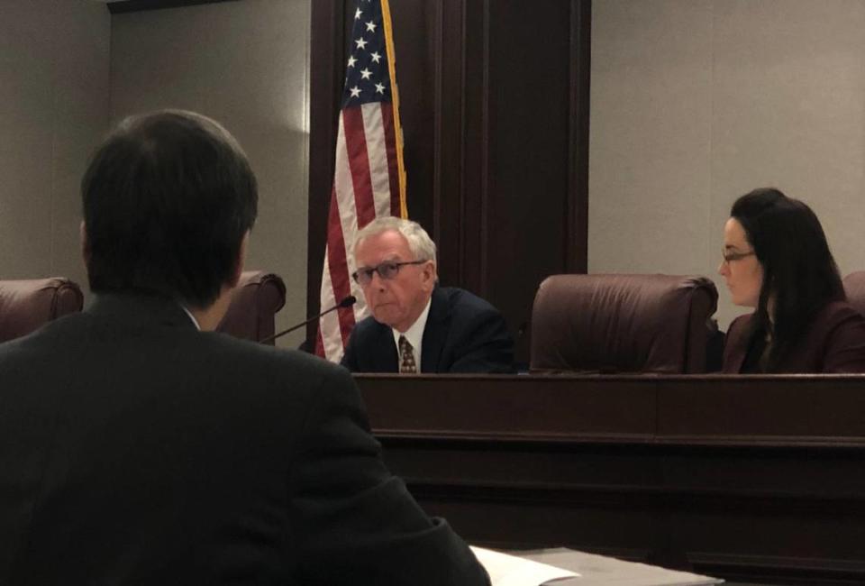 Special master Dudley Goodlette listens to Scott Israel lawyer Ben Kuehne during a case management hearing Feb. 19.