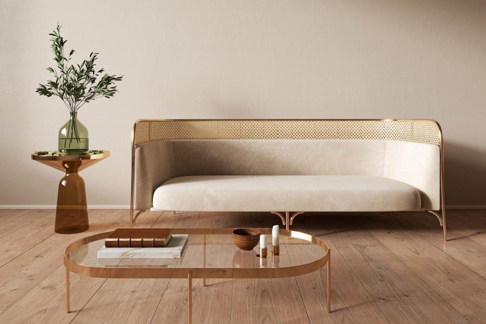 Neutral taupe and cream sitting area with table and plant