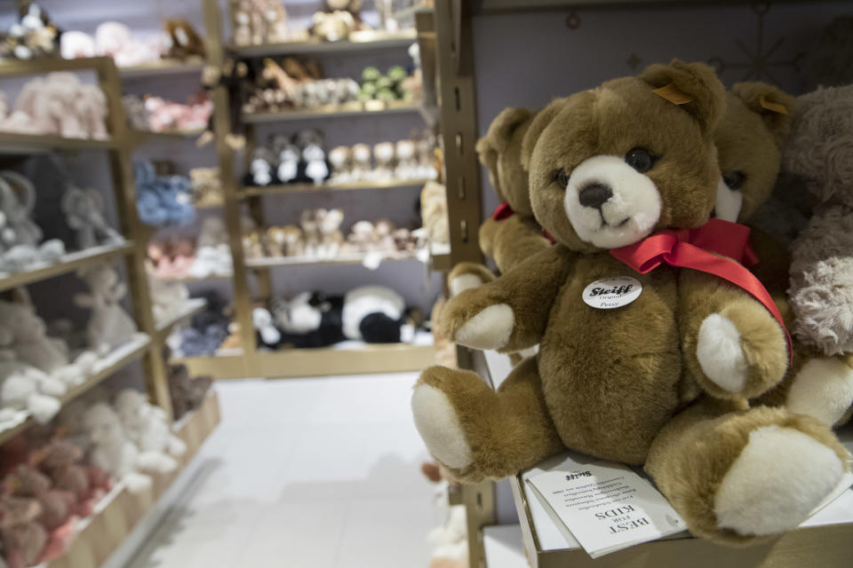 In this Tuesday, Nov. 13, 2018 photo, Steiff teddy bears are on display during a media preview of the new FAO Schwarz store at Rockefeller Center in New York. Three years after it closed its beloved, fantasy land of a toy store on Fifth Avenue, FAO Schwarz makes its return to New York City. The new version will be smaller, but will have familiar attractions including a musical clock tower and the giant piano keyboard mat on which Tom Hanks danced in the film “Big.” (AP Photo/Mary Altaffer)