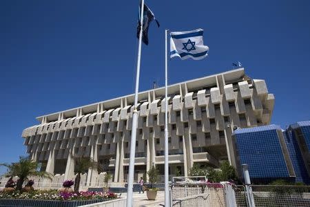 An Israeli flag flutters outside the Bank of Israel building in Jerusalem August 7, 2013. REUTERS/Ronen Zvulun