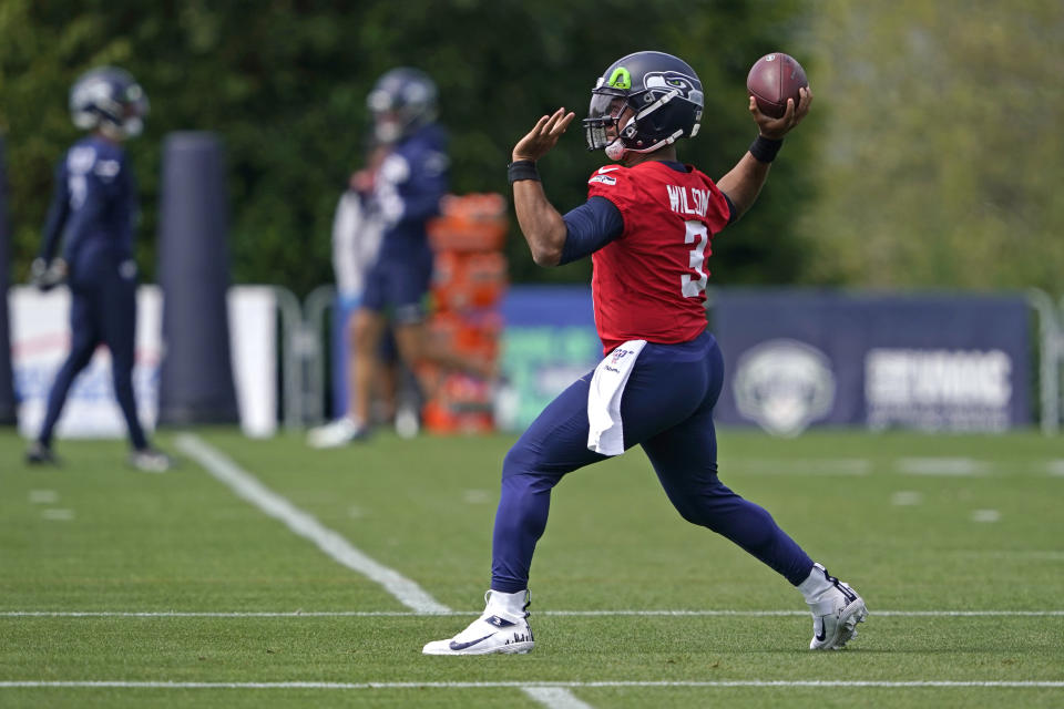 Seattle Seahawks quarterback Russell Wilson passes during a practice drill at NFL football training camp, Wednesday, Aug. 12, 2020, in Renton, Wash. (AP Photo/Ted S. Warren, Pool)