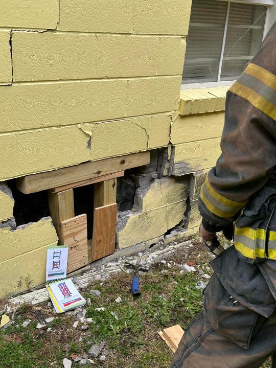Car strikes building on Wellons St. (Courtesy: Suffolk Department of Fire and Rescue)