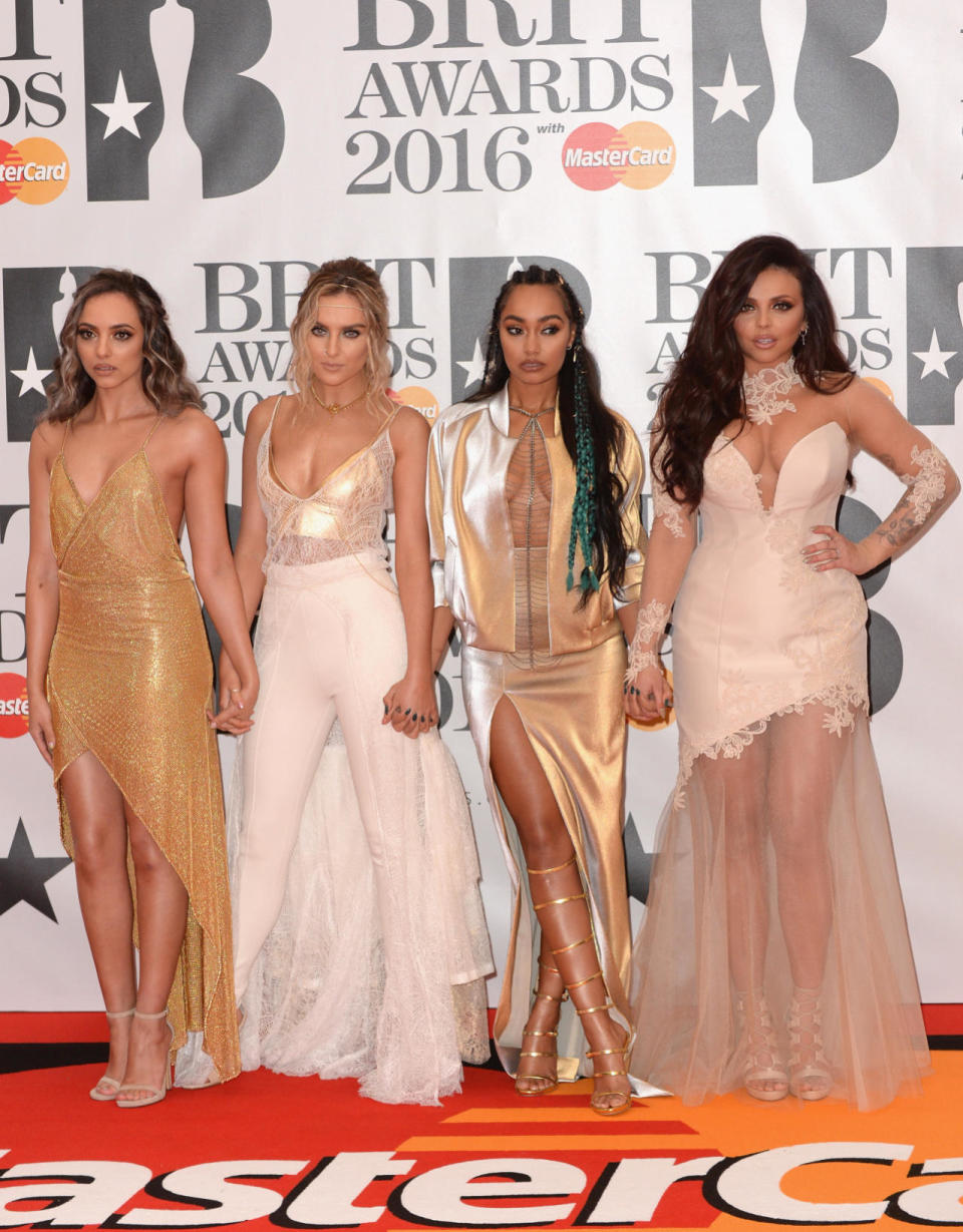 Little Mix in coordinating gold and champagne looks. 