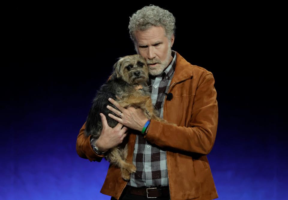 Will Ferrell and his "Strays" co-star Sophie appear onstage at CinemaCon.