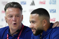 Head coach Louis van Gaal of the Netherlands and his player Memphis Depay attend Netherlands official press conference on the eve of World Cup soccer match between Netherlands and Argentina in Doha, Qatar, Thursday, Dec. 8, 2022. (AP Photo/Eugene Hoshiko)